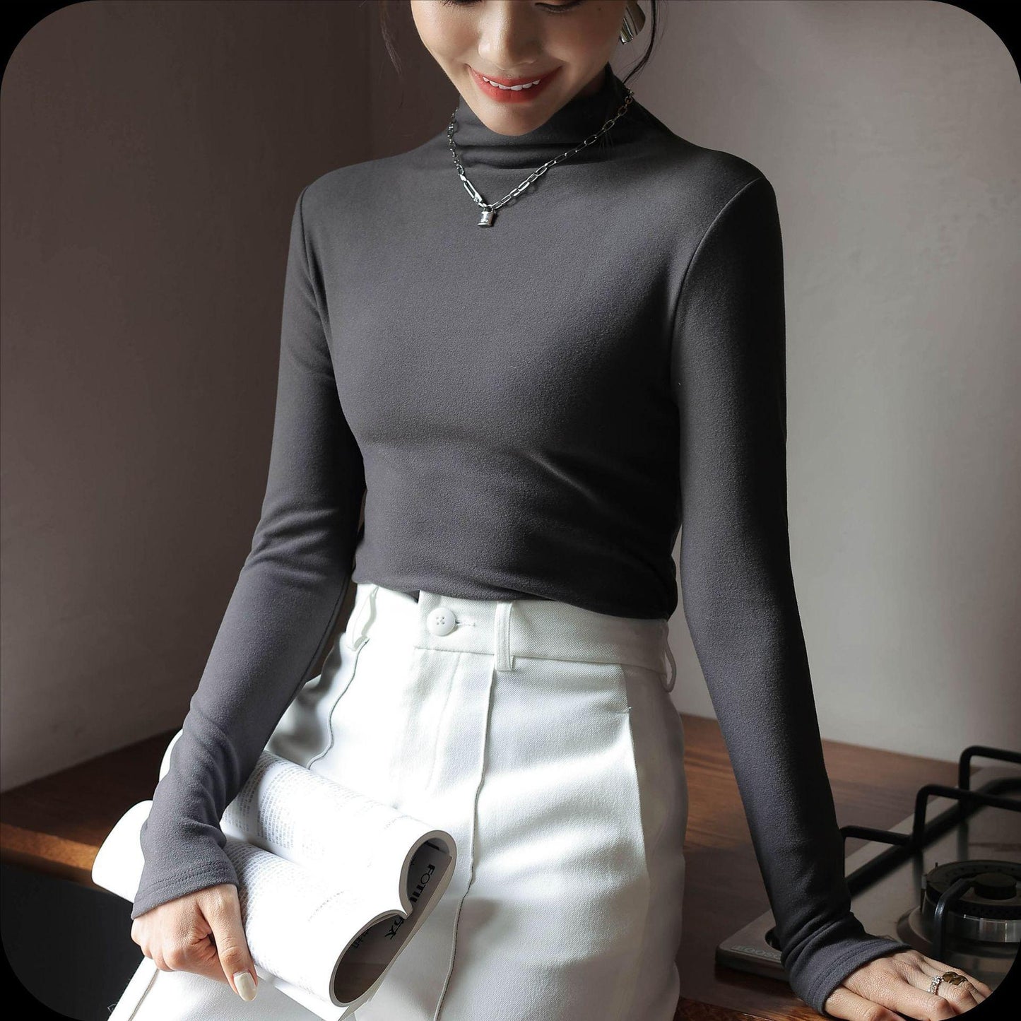 Solid color long sleeved T-shirt with half high neck base